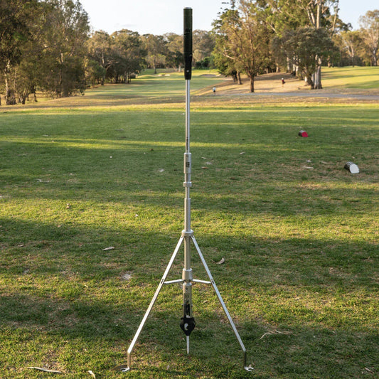 T-UP Assist golf teeing aid on a tee box  in a golf course
